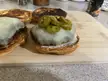 Tonight’s eats - Patty seared in case iron skillet, topped with sharp cheddar and pickled jalapeños with garlic aioli on a sesame seed bun.