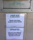 That warning sign on a library drop box