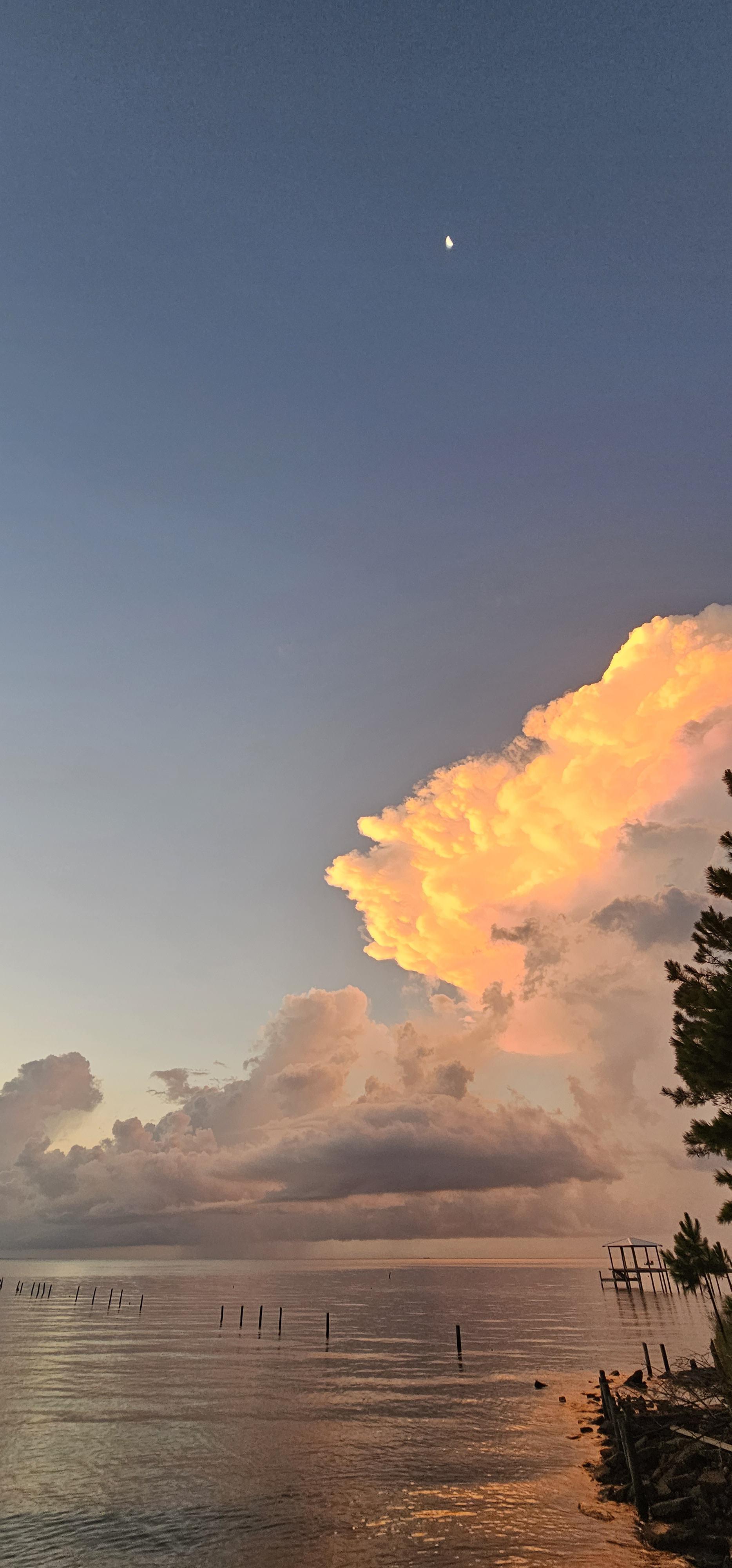 Sunrise on the Gulf Coast, Coden, Alabama [OC] The cloud was a thunderstorm and we were treated to a brief but spectacular lightning storm too.