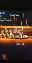 Terraria gameplay screenshot featuring a character with a Takonomicon weapon from The Stars Above mod in a cavern