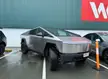 Cyber Truck needs 10% more parking at Bunnings.