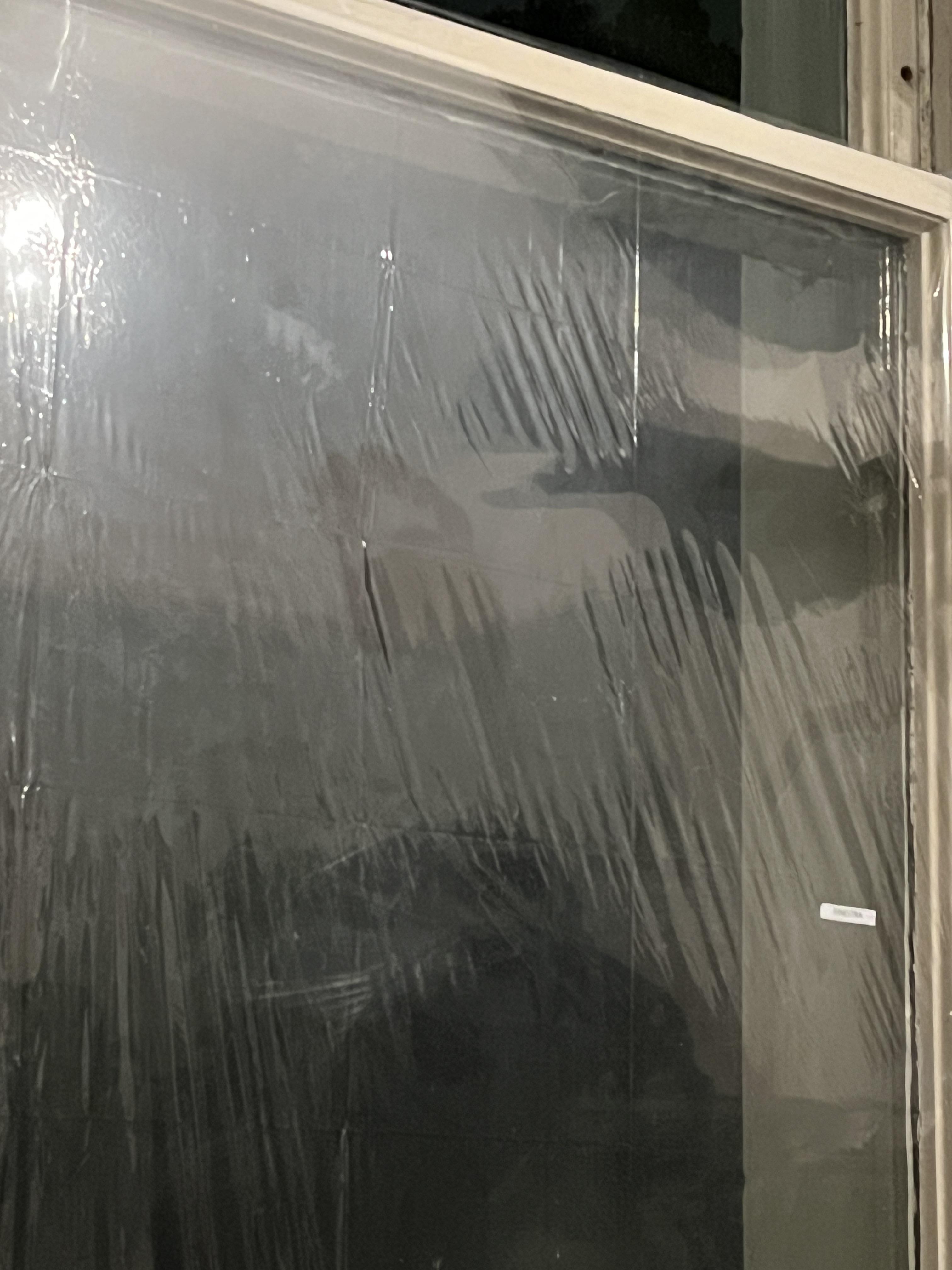 A footprint just appeared on my window's plastic cover.