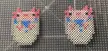 Mini perler bead axolotls in buckets