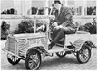 Ole Kirk Christiansen, inventor of LEGO, and his wooden car, 1930s