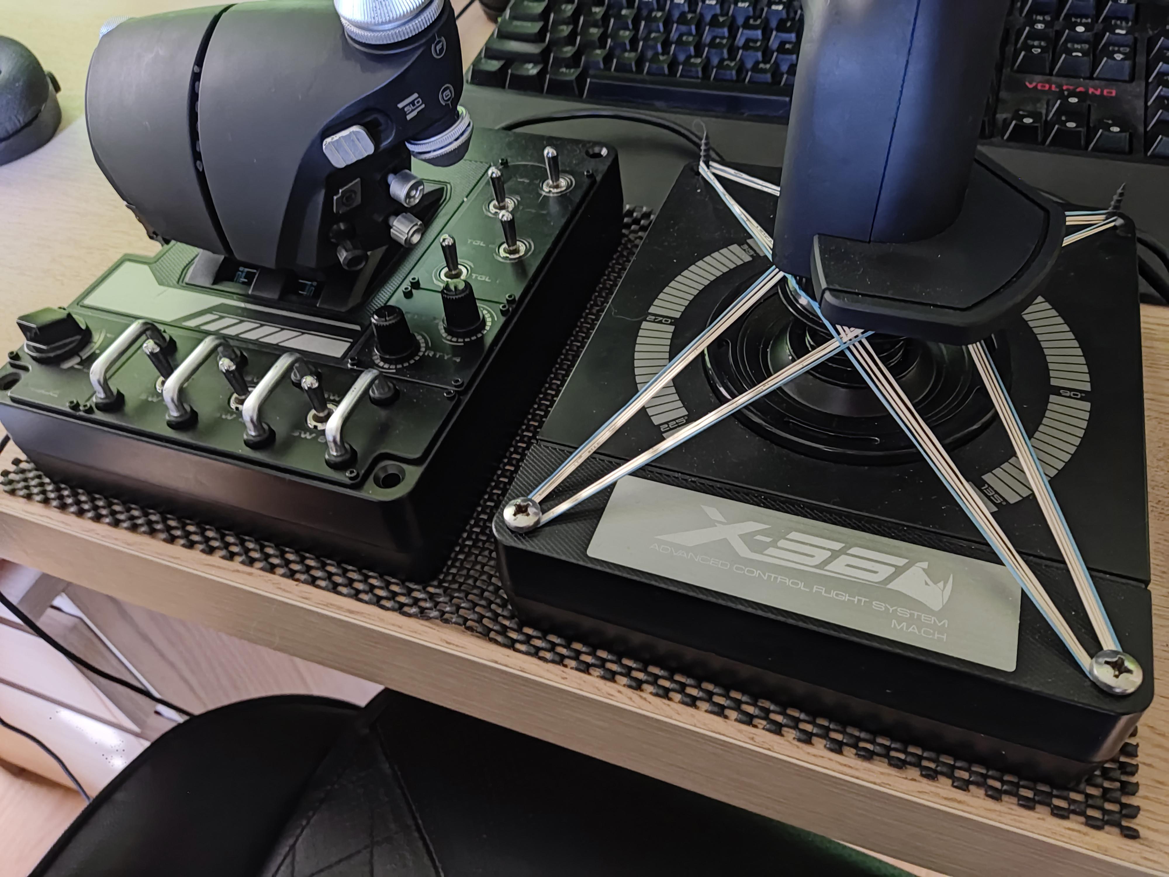 Anti-slip mat for a HOTAS setup on a wooden surface