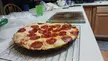 Homemade cast iron pan pizza
