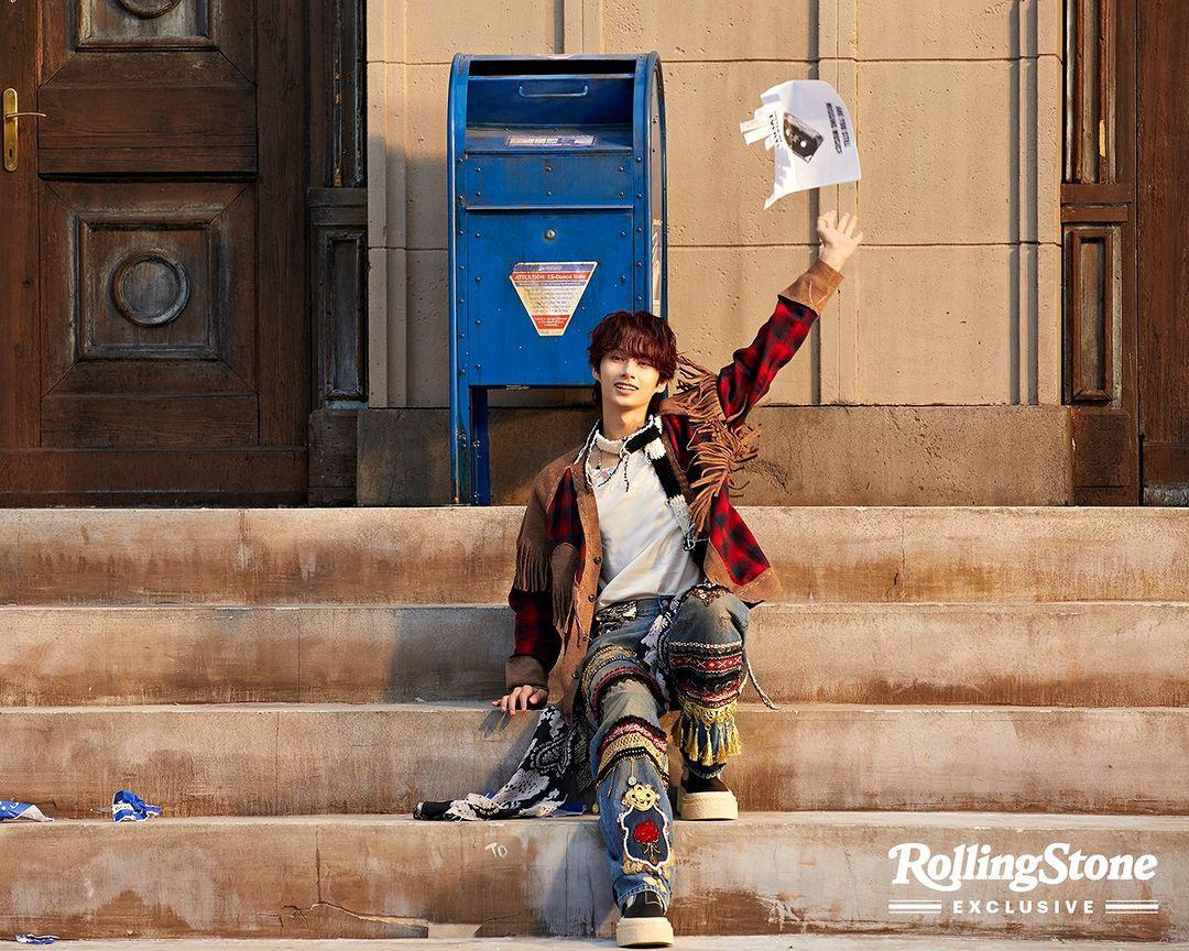 SEVENTEEN kpop idols in 2000s style streetwear, wearing cardigans, ripped blue denim jeans, and colorful knitwear.