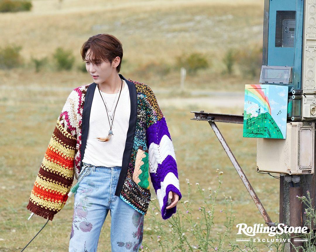 SEVENTEEN kpop idols in 2000s style streetwear, wearing cardigans, ripped blue denim jeans, and colorful knitwear.