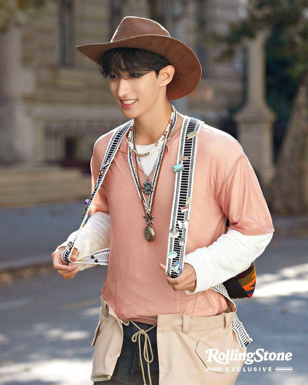SEVENTEEN kpop idols in 2000s style streetwear, wearing cardigans, ripped blue denim jeans, and colorful knitwear.