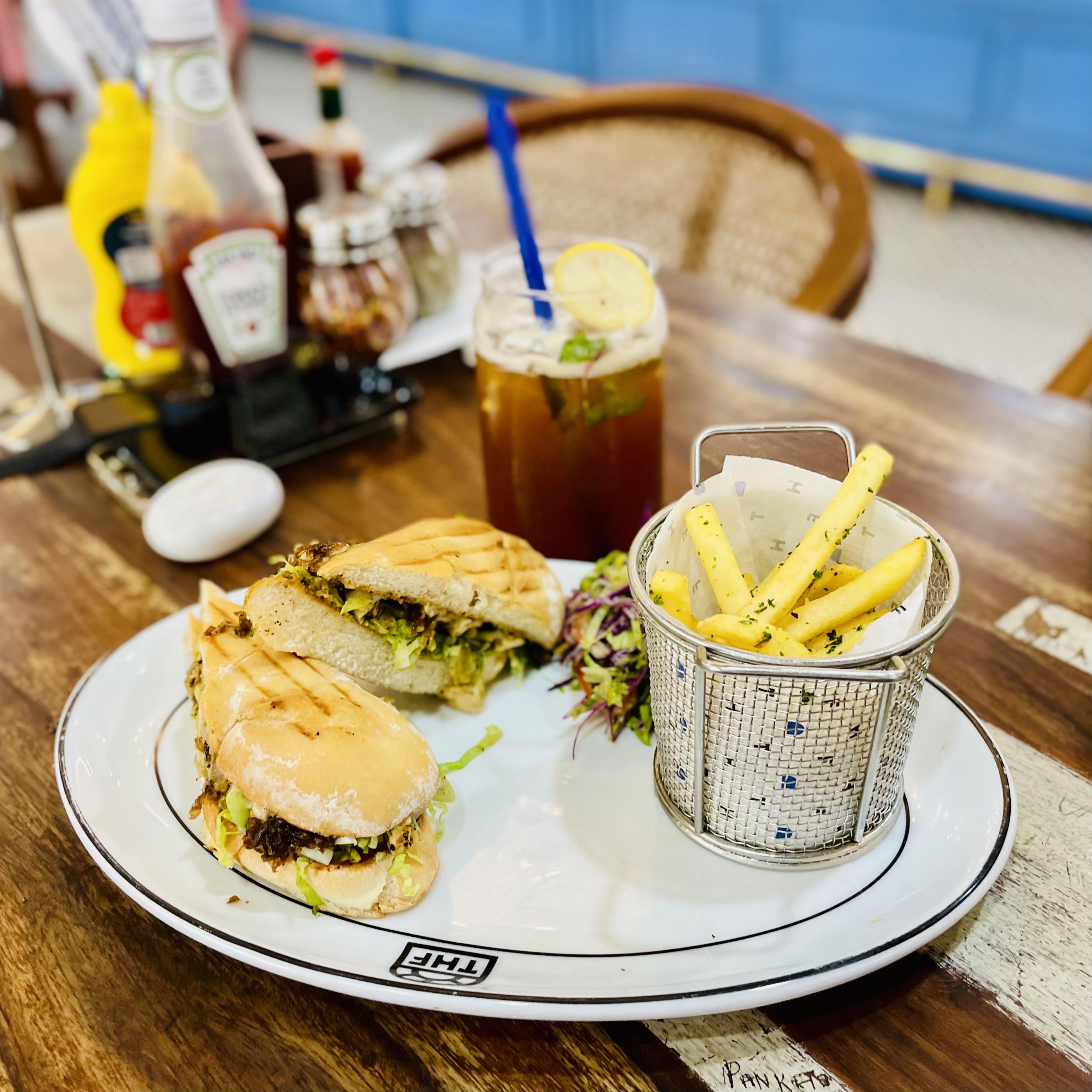 Grilled Tea Iced lemon tea with a grilled sandwich filled with shredded veggies and ...