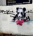 Is anyone able to tell me who this dude is? Saw a bunch of pandas in skeleton costumes around Paris and am wondering why.