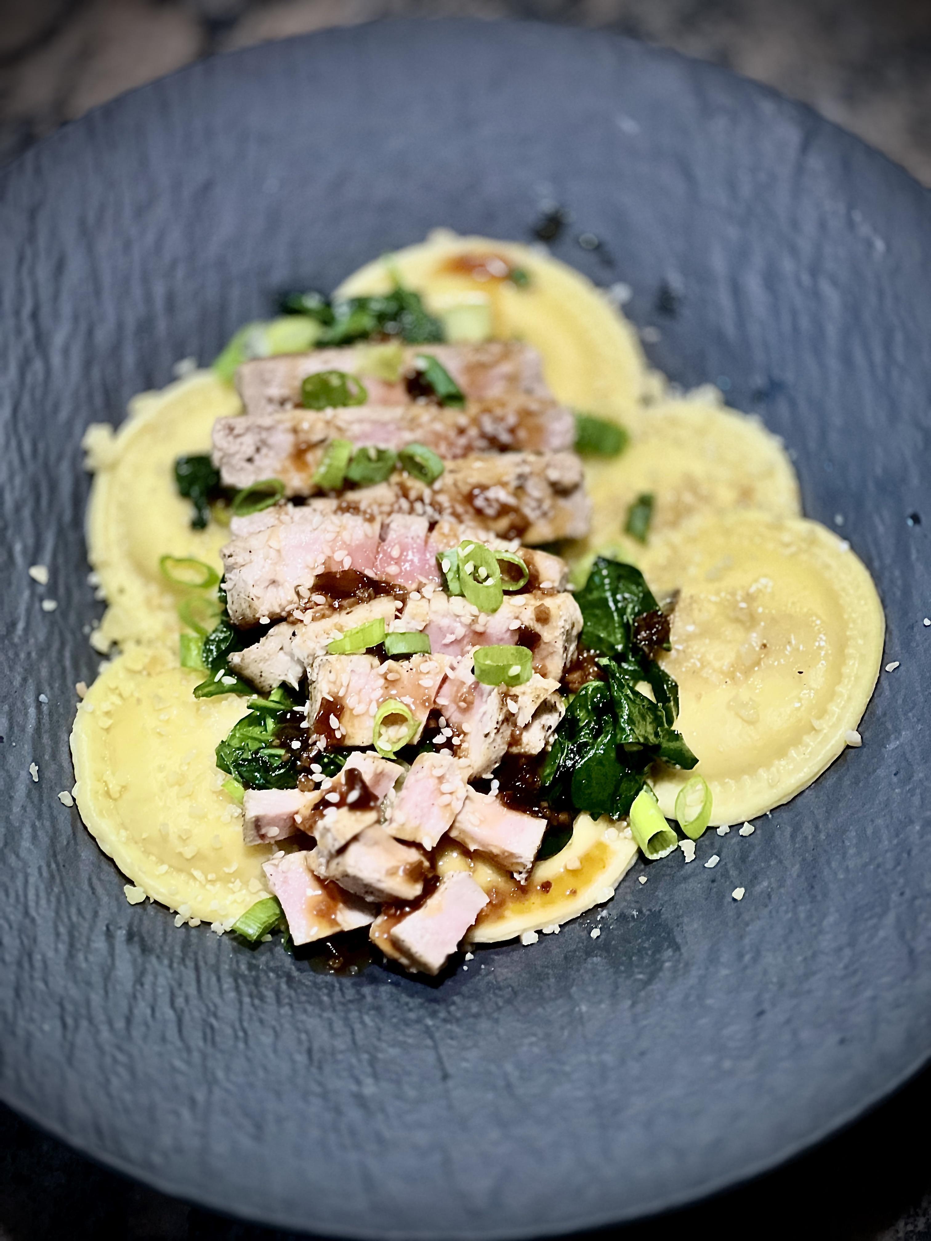 [homemade] seared tuna over sauteed spinach over ravioli. | Scrolller