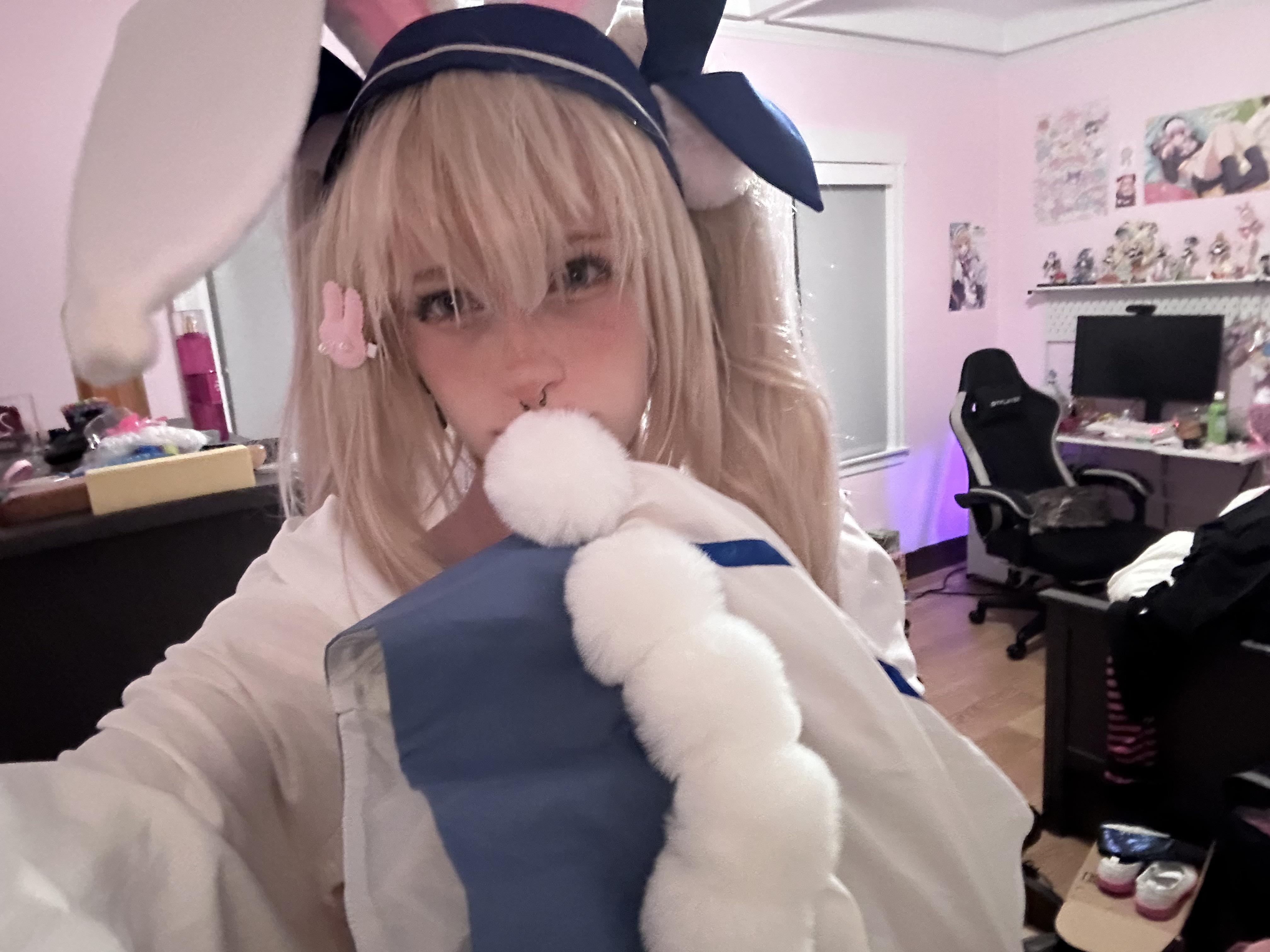 Laffey from Azur Lane in a white and blue bunny cosplay outfit with bunny ears
