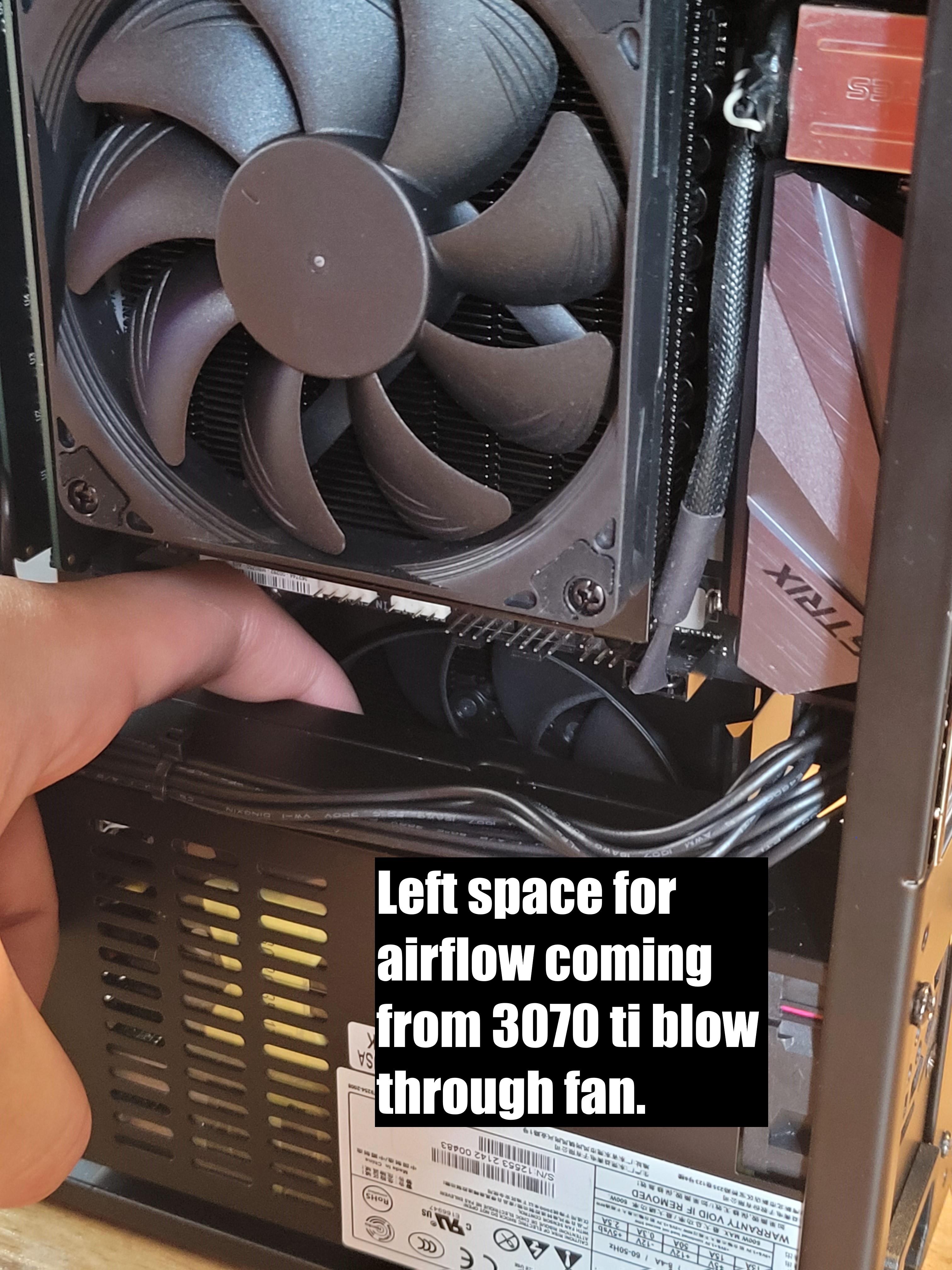 SFFPC build featuring a Founders Edition 3070 ti graphics card and cooling fan inside a sub 5L Velka 5c case