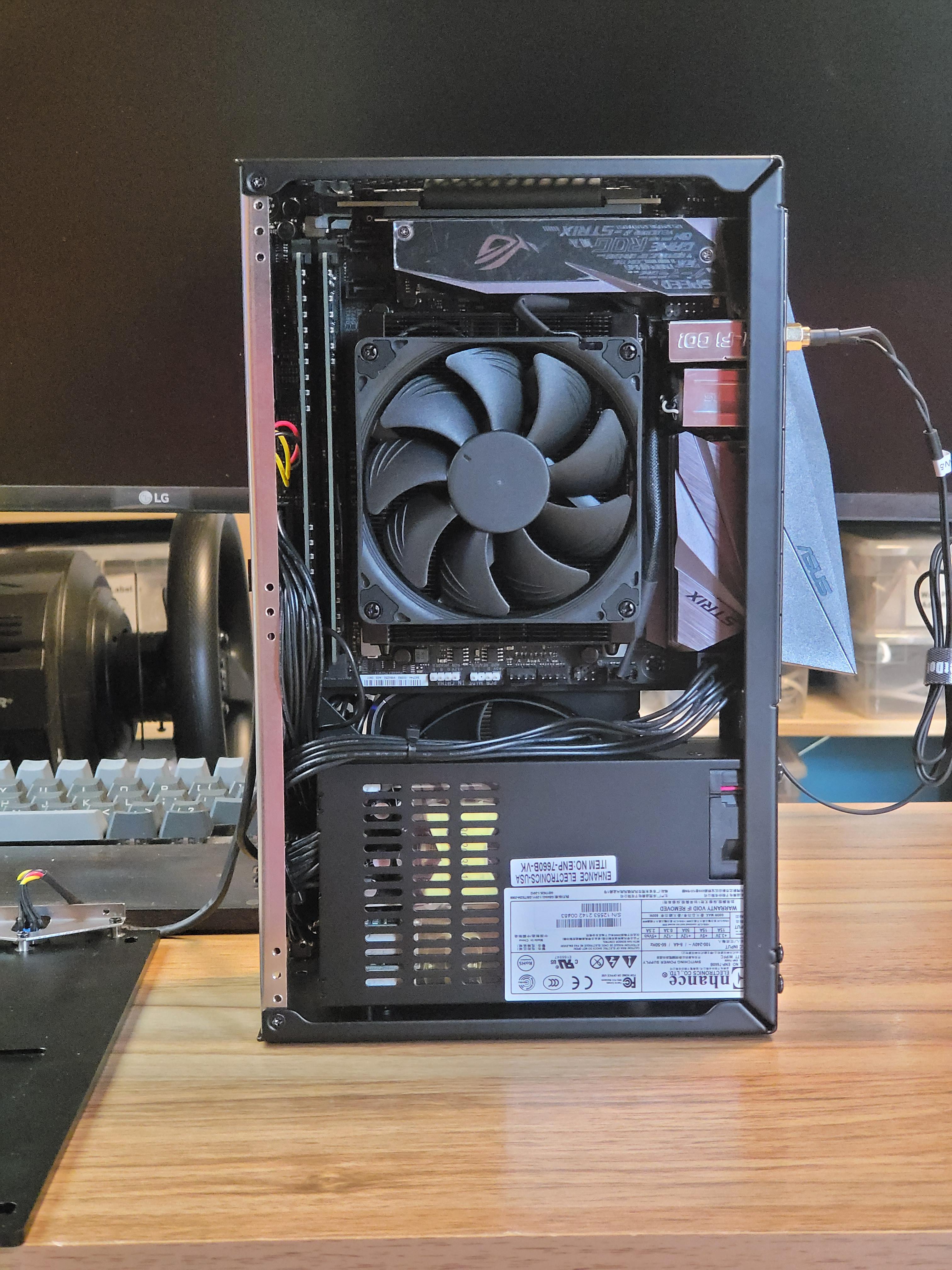 SFFPC build featuring a Founders Edition 3070 ti graphics card and cooling fan inside a sub 5L Velka 5c case