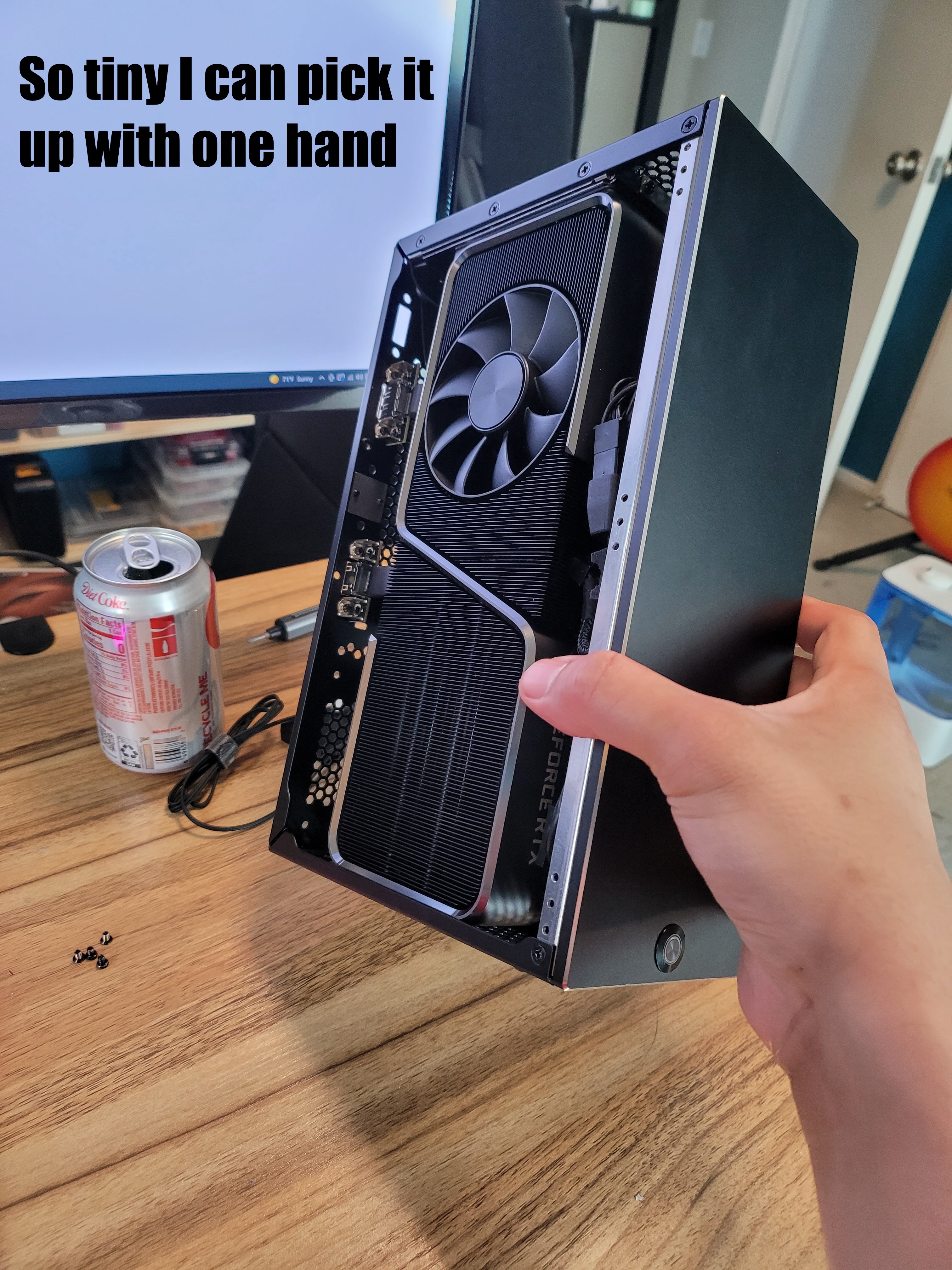 SFFPC build featuring a Founders Edition 3070 ti graphics card and cooling fan inside a sub 5L Velka 5c case