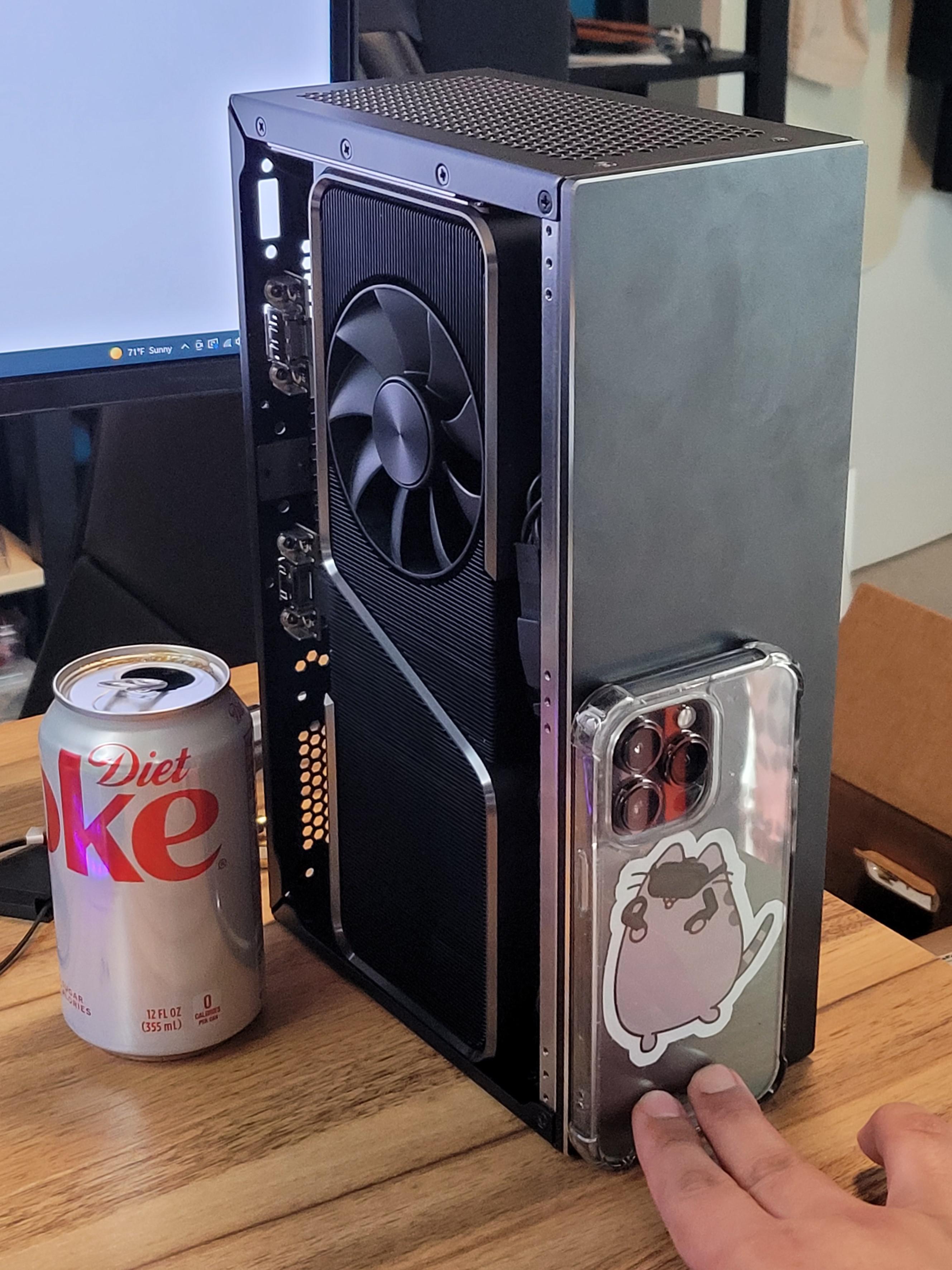 SFFPC build featuring a Founders Edition 3070 ti graphics card and cooling fan inside a sub 5L Velka 5c case