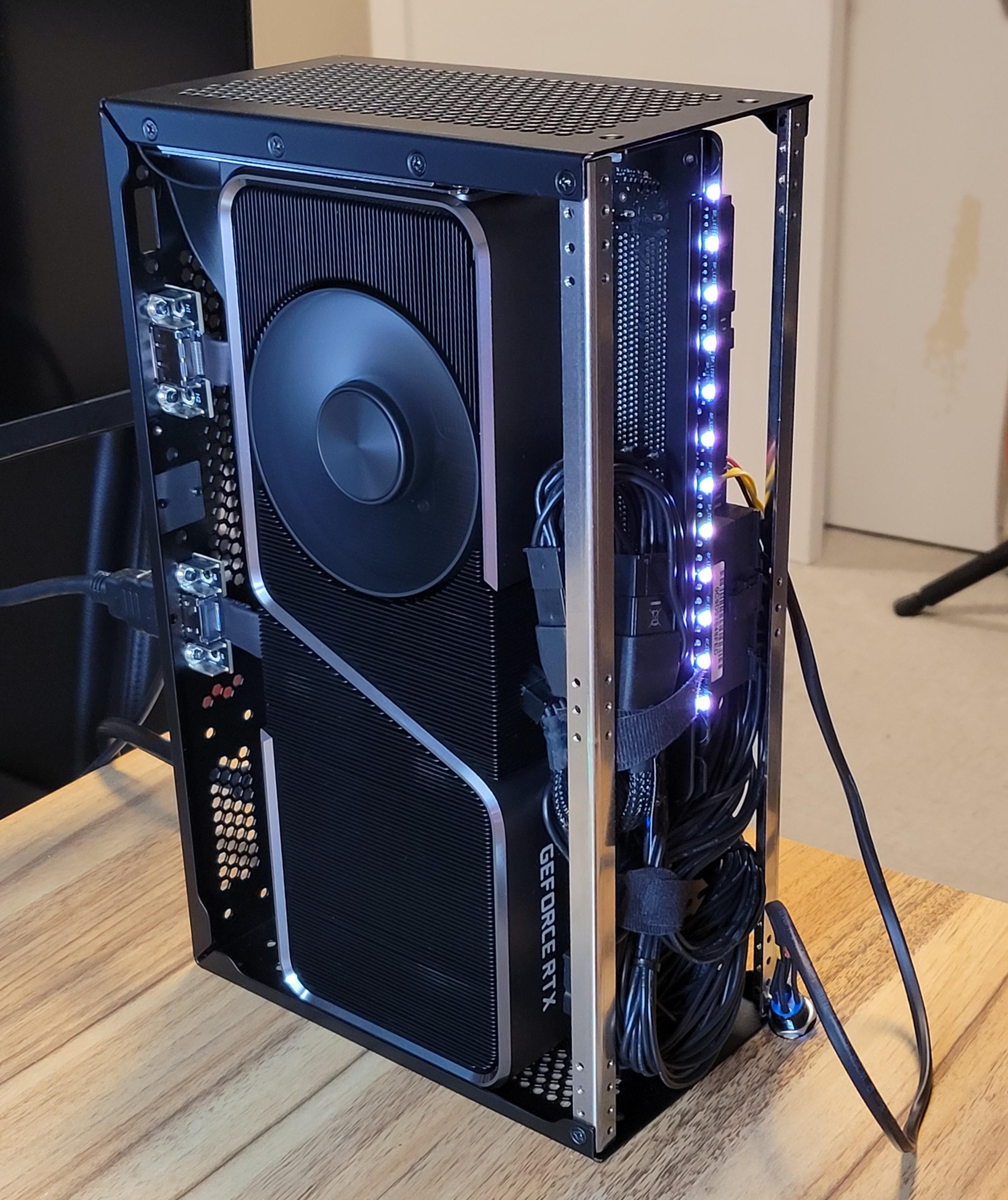 SFFPC build featuring a Founders Edition 3070 ti graphics card and cooling fan inside a sub 5L Velka 5c case