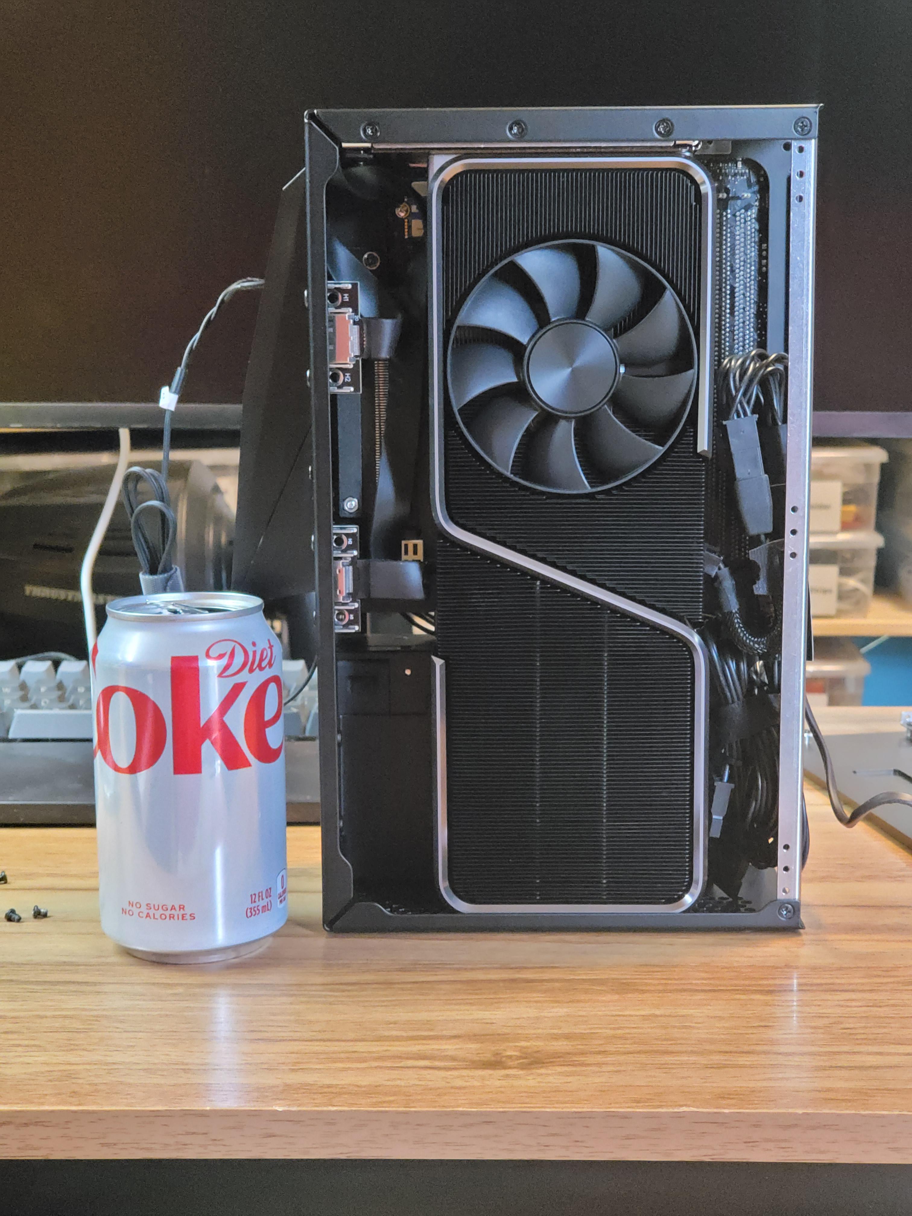 SFFPC build featuring a Founders Edition 3070 ti graphics card and cooling fan inside a sub 5L Velka 5c case