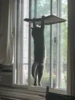 Kosmo just got his window perch, but he hasn’t figured out how it works yet.