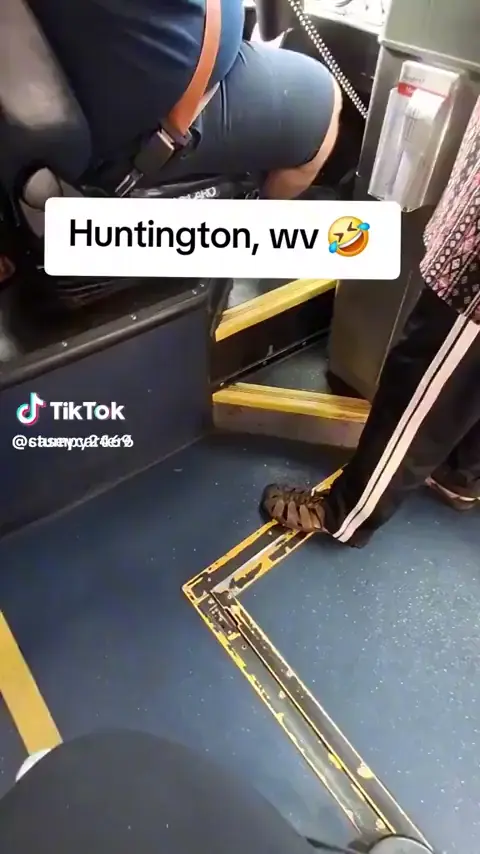 Lady freaks out over having to pay $1 to ride the bus.