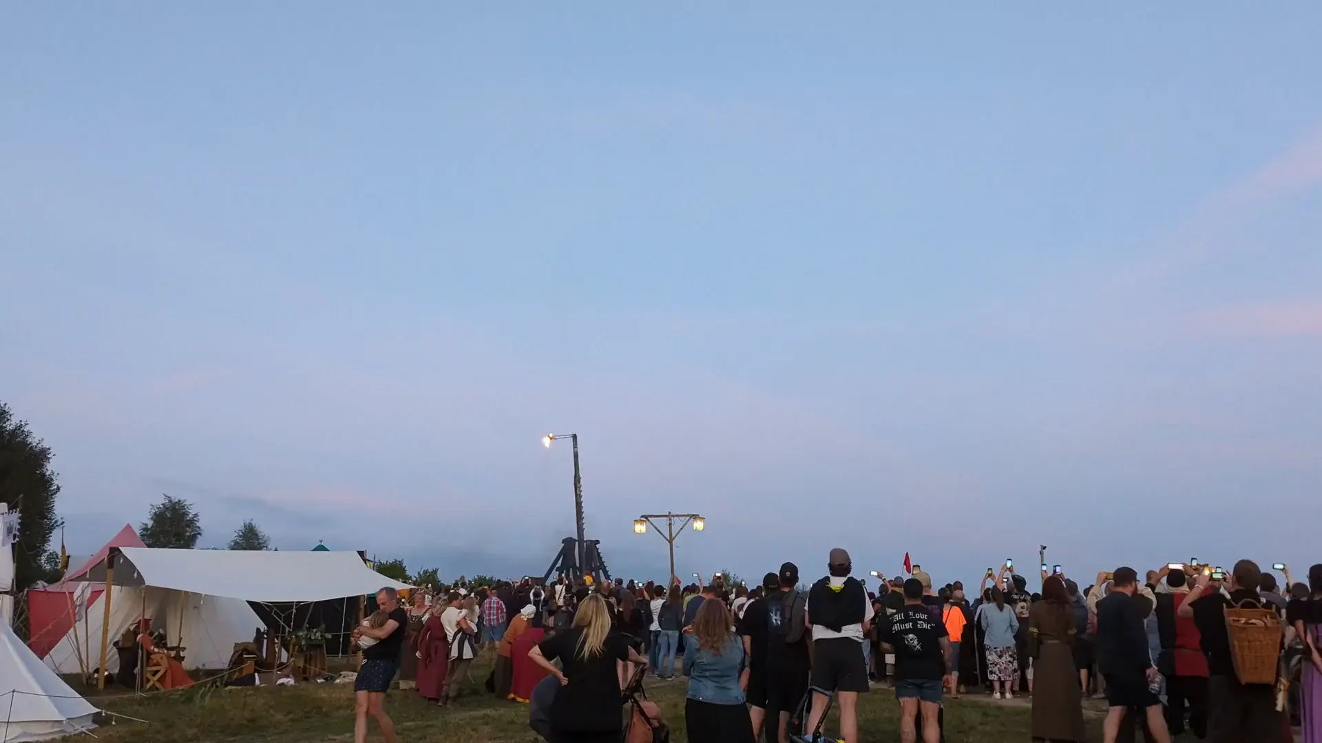 Launching a ball of fire using a mighty trebuchet in Germany