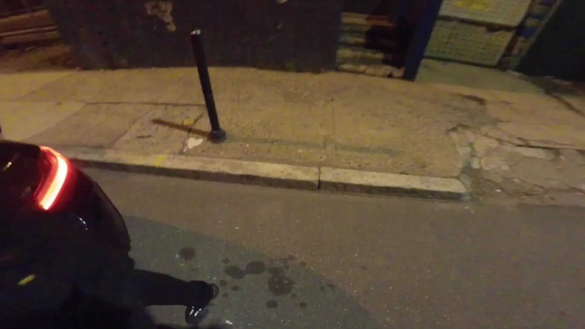Man drifts through streets at night