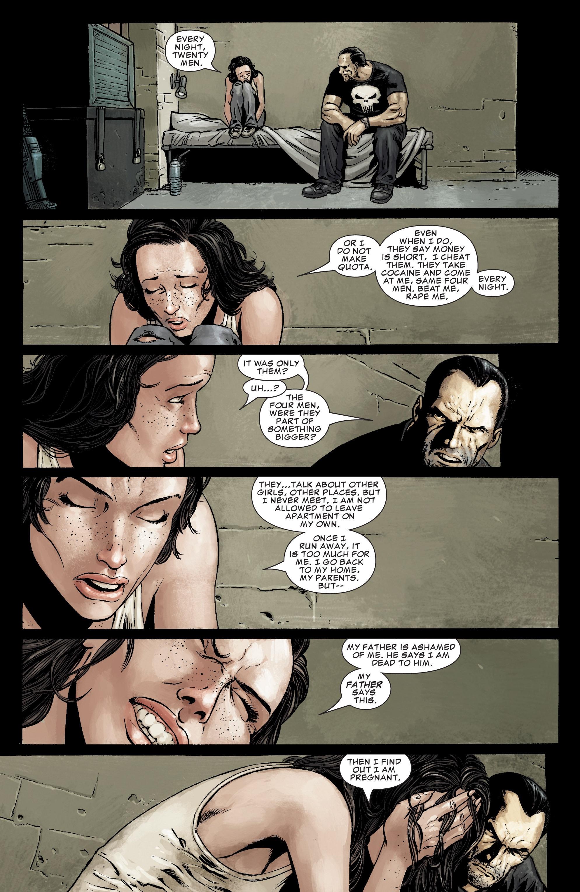 The Punisher #26 comic book art of a scared woman with pale skin curled up on a bed in a sparse room.