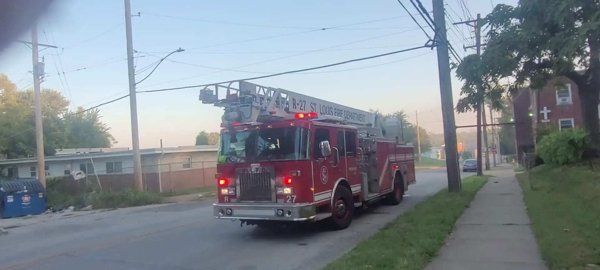 Multiple fire departments with police units on scene of a house fire in University City, Missouri(part 1)