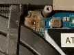 My 7 y/o Dell XPS has a corroded and broken off component, don't know what it is but it doesn't prevent it from running