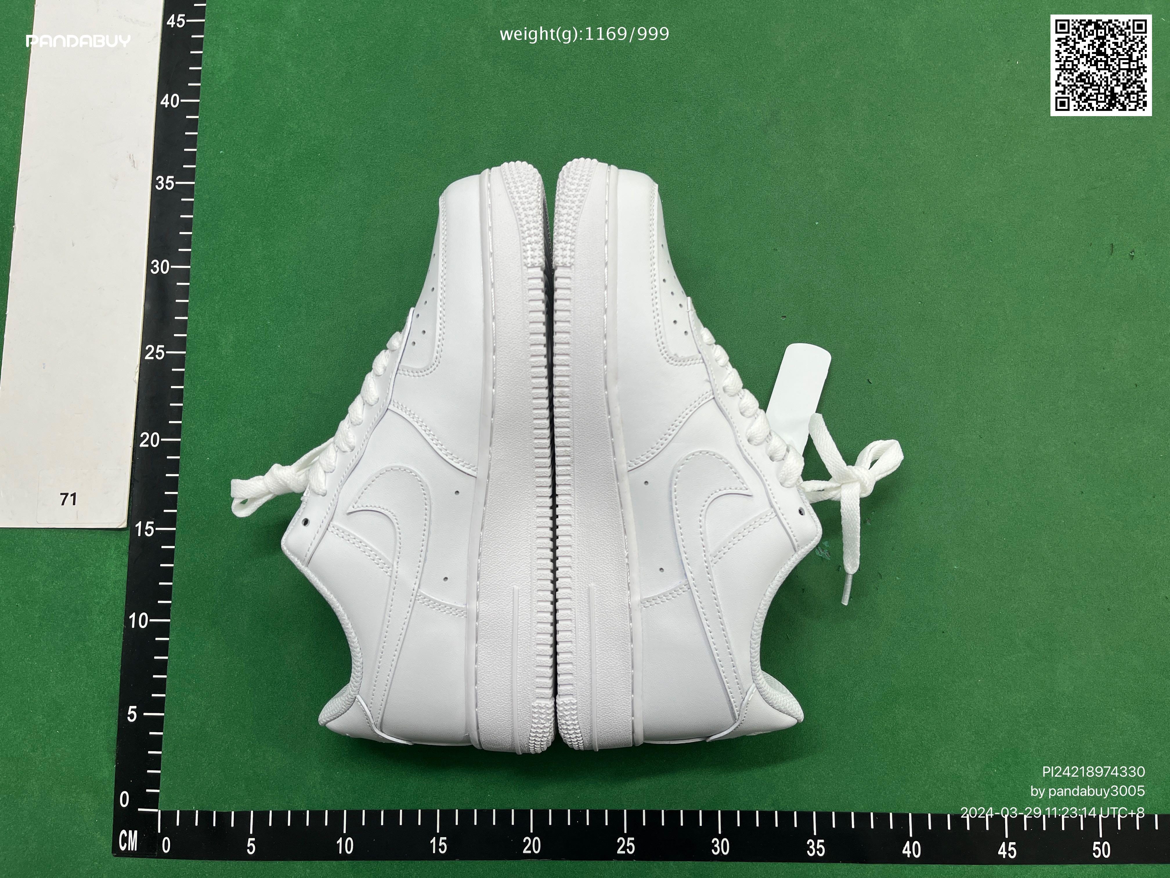 Pandabuy haul of streetwear including Gallery Dept, Spotify, and FC Barcelona shirts and sneakers on a green background