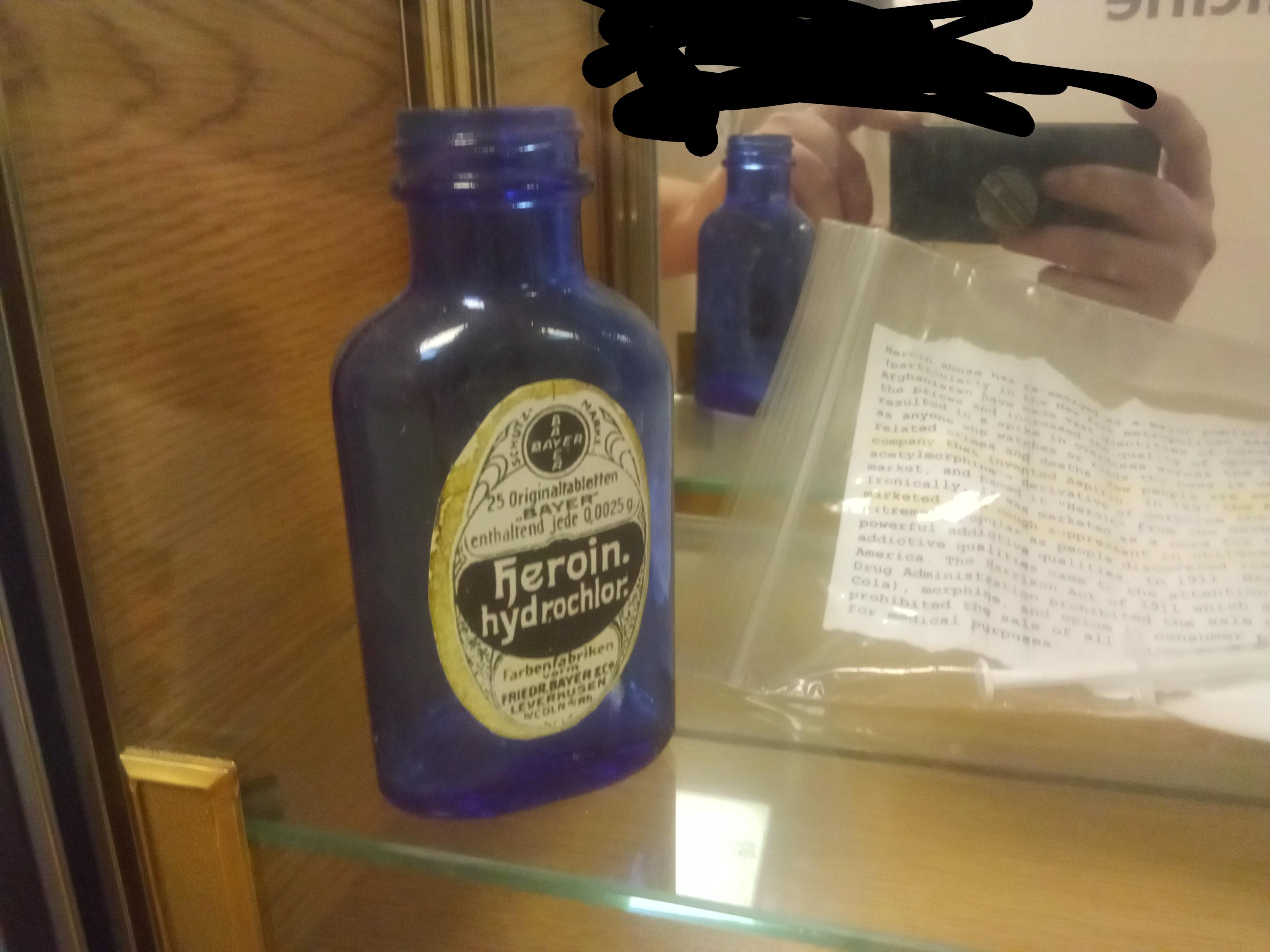 These pharmaceutical heroin bottles are in a display case at the hospital