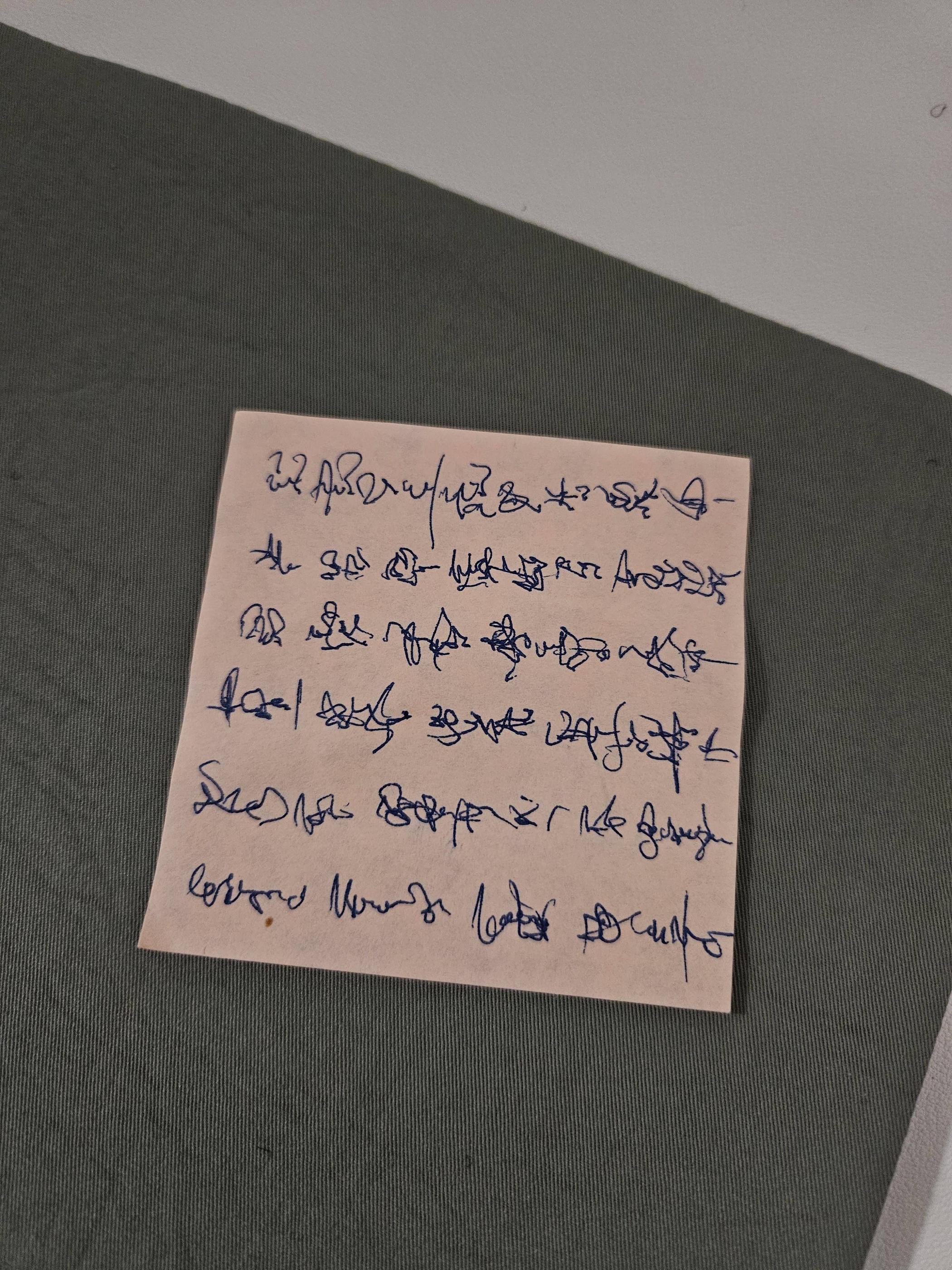 Mediocre Chinese handwriting posted sideways with no indication that it's even a different language