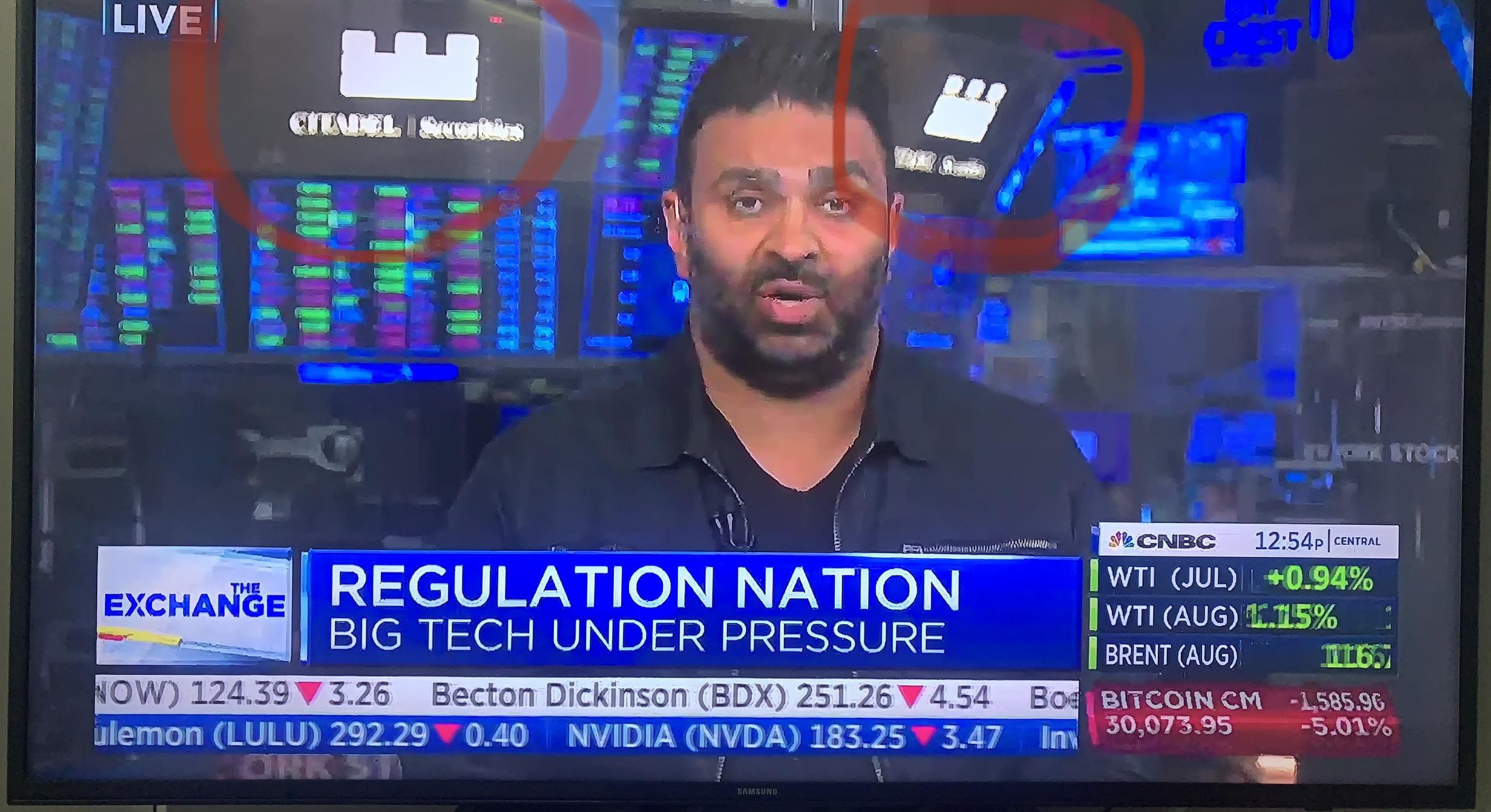 CNBC news broadcast screenshots featuring GME and Citadel Securities reports with a news presenter and staff.