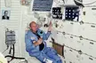 PLT Gordon Fullerton on the middeck of Columbia during STS-3. Also pictured, an unidentified NASA official.