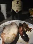 Power gonna be out for a while after hurricane Helene so we're grilling what we have frozen - chicken breast and sausage with garden peppers