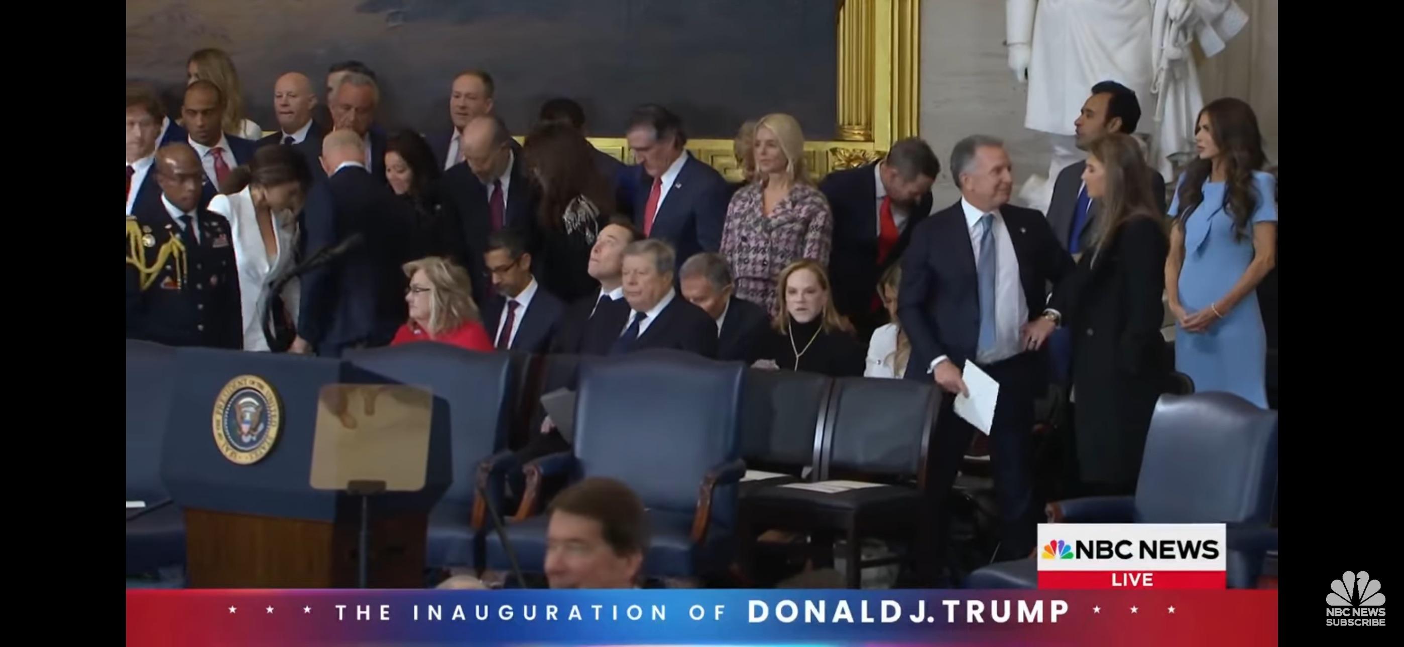 Celebrity couple in a white shirt and white dress attending the Trump Inauguration 2025