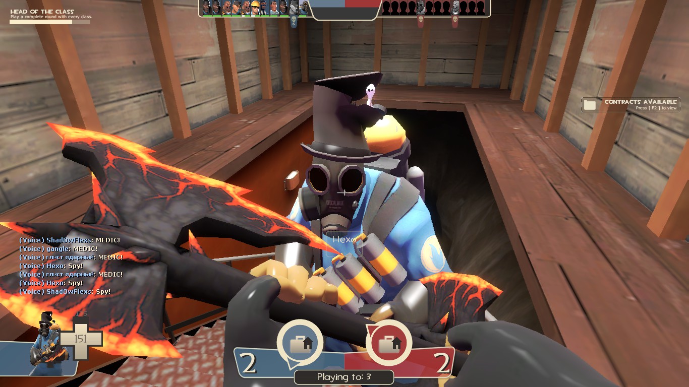 Team Fortress 2 characters in stylized costumes and armor fighting in an industrial facility