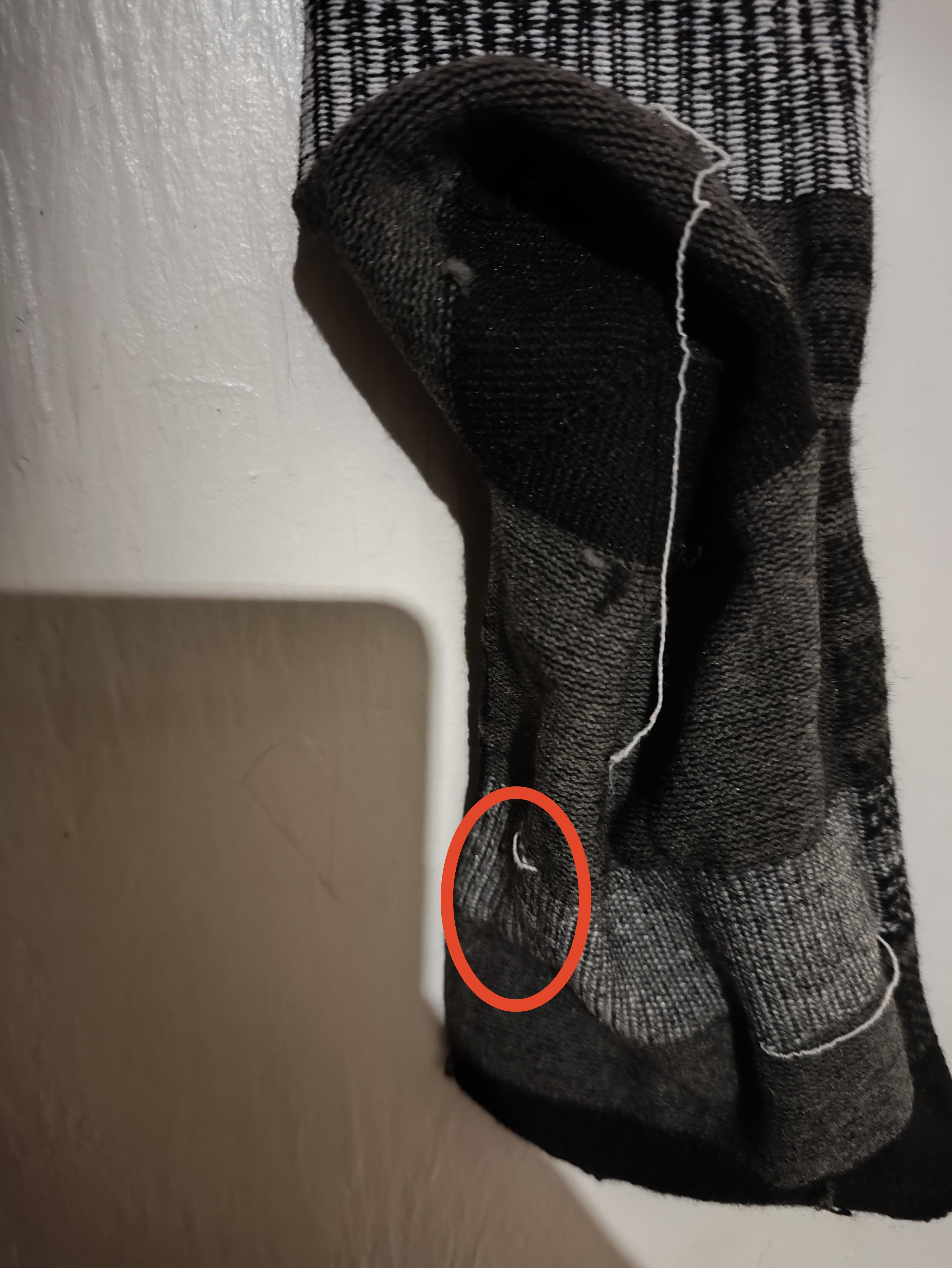 Loose threads on inside of sock? | Scrolller