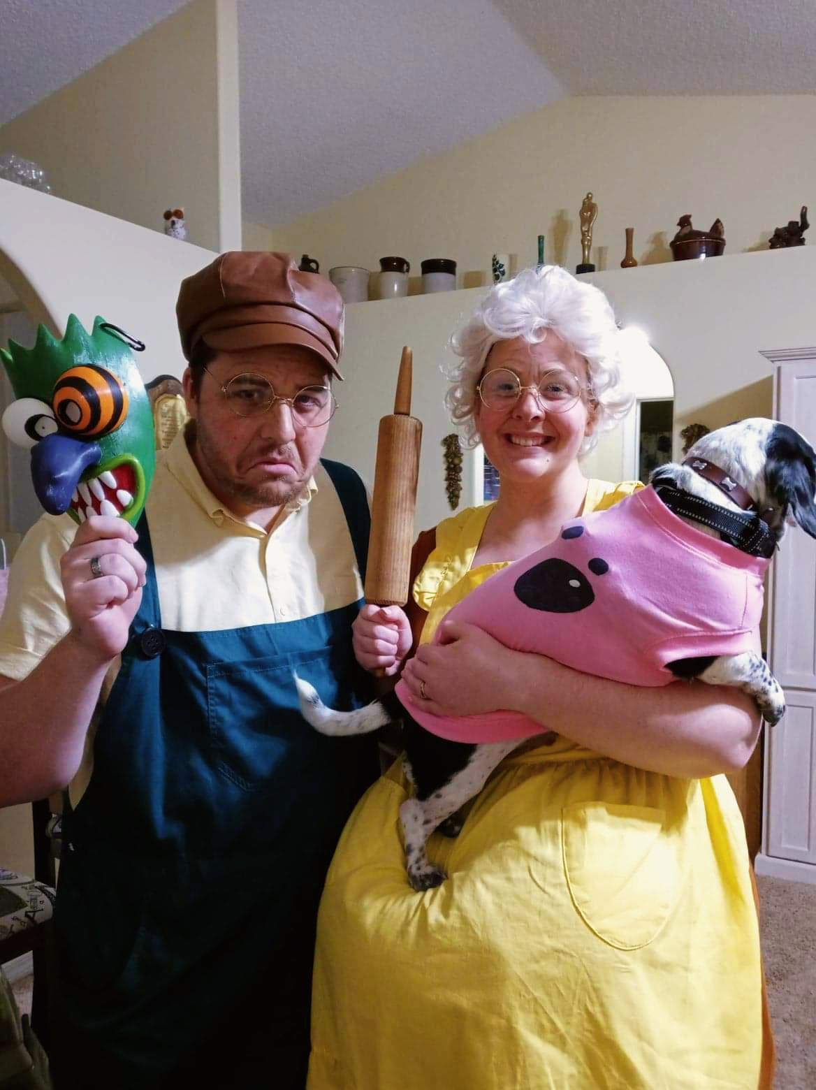 Courage the Cowardly Dog costumes featuring a person in a green monster mask and a person in a housewife costume