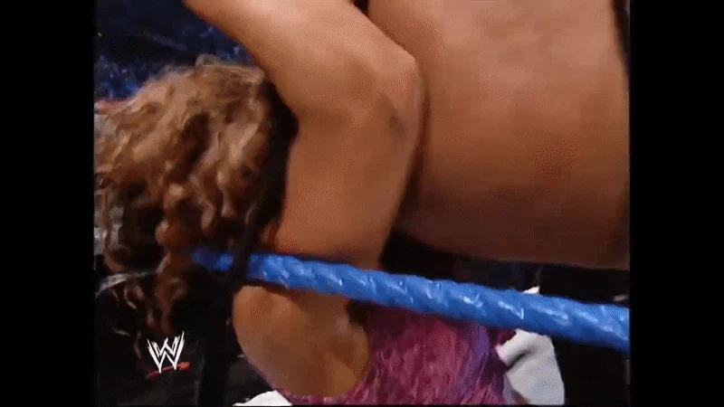 Rikishi grinding his ass on Nidia.