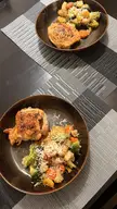 Roast chicken thighs and stir fried veggies topped with Romano cheese. Was delicious!