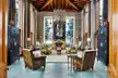 Tall living room with wooden ceiling
