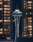 The Space Needle piercing the night sky.