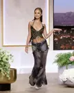 Tyla wearing a Blumarine SS23 RTW butterfly beaded halter crop top and a sheer denim waist skirt