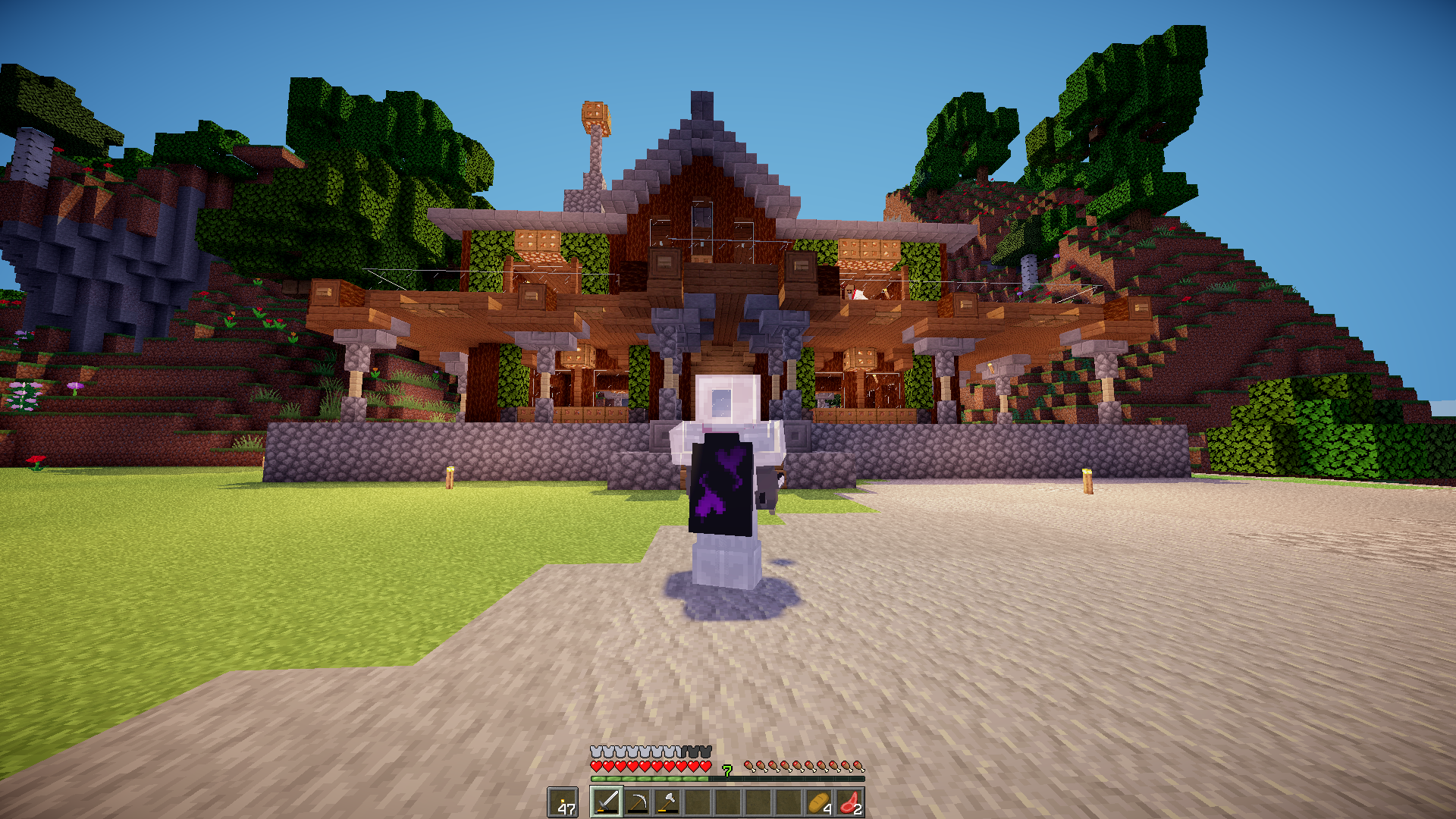 Minecraft player character in a white and purple outfit standing before a cute wooden house build
