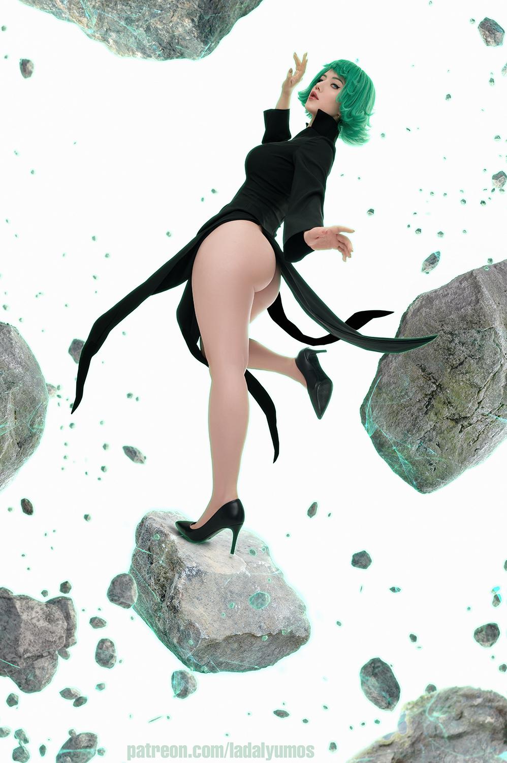 Tatsumaki (Lyumos) in a black open-front jacket and thong, showing her ass and thick thighs in a surreal space.