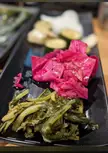 What is the name of the pickled green side dish?