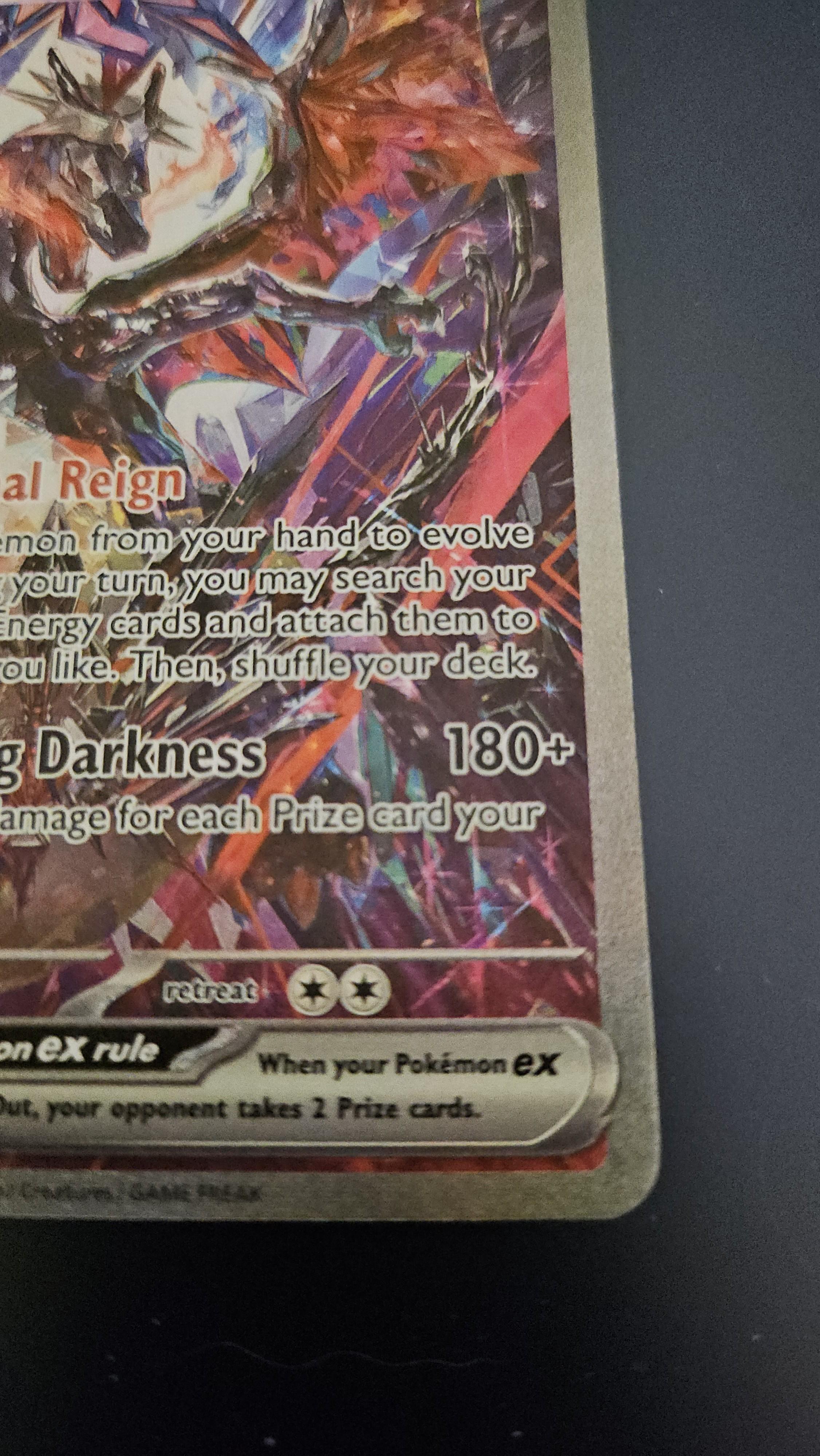 Charizard Pokémon card front and back on a dark surface