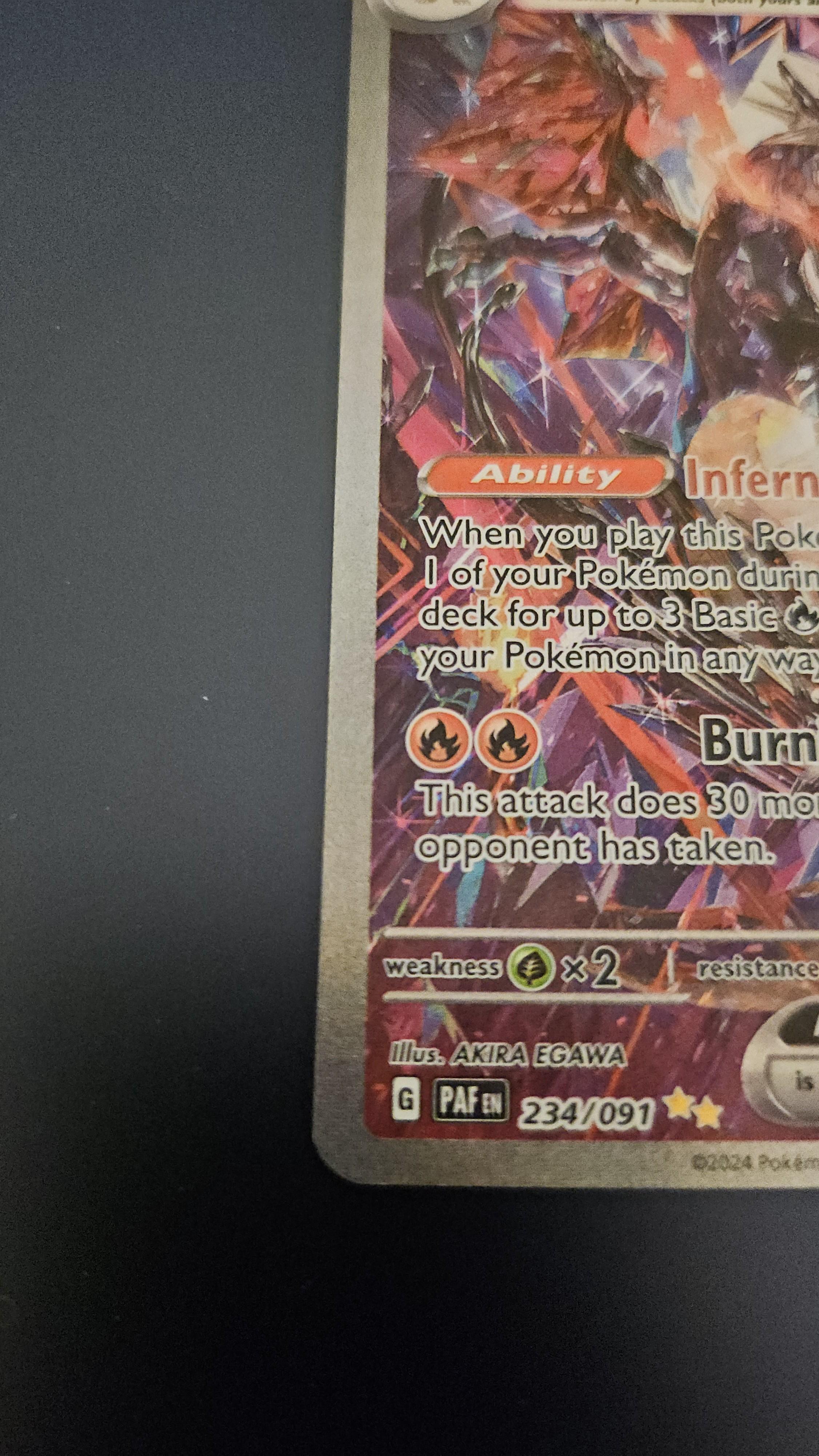 Charizard Pokémon card front and back on a dark surface